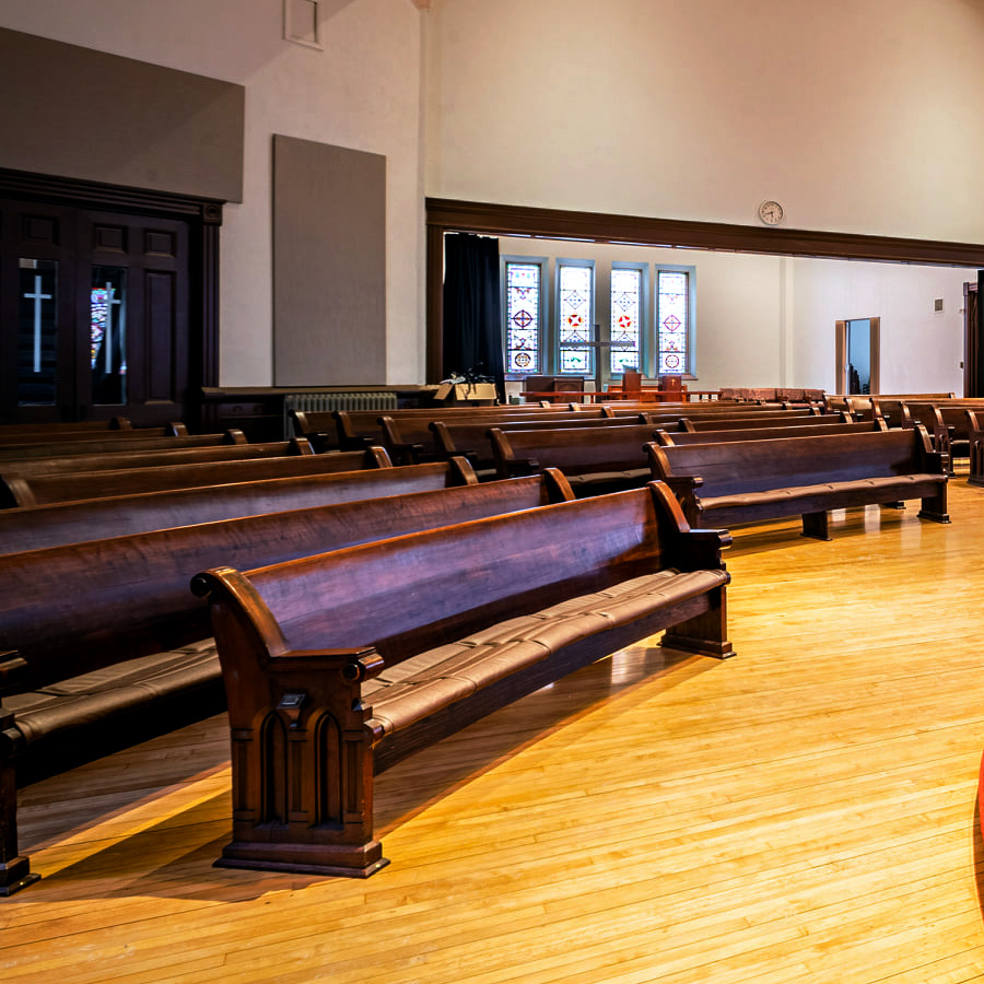 Image of the church pew seating in Cappella Performing Arts Center.