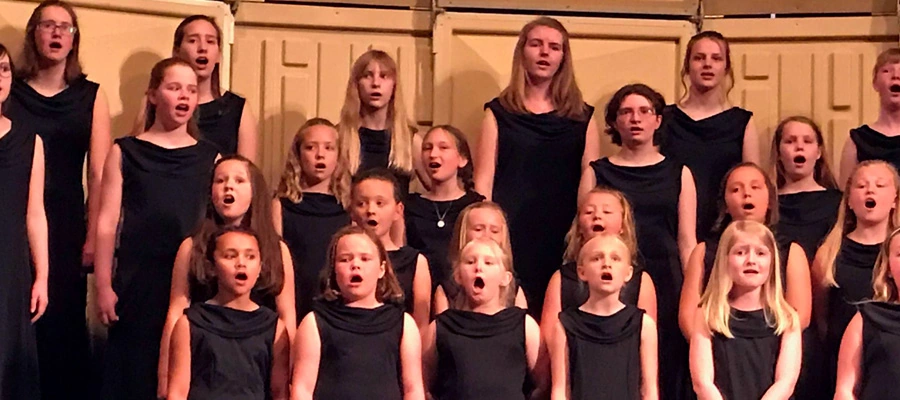 La Crosse Girlchoir signing at a formal performance in Wisconsin.