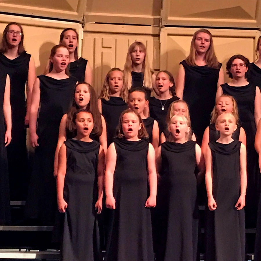 La Crosse Girlchoir signing at a formal performance in Wisconsin.